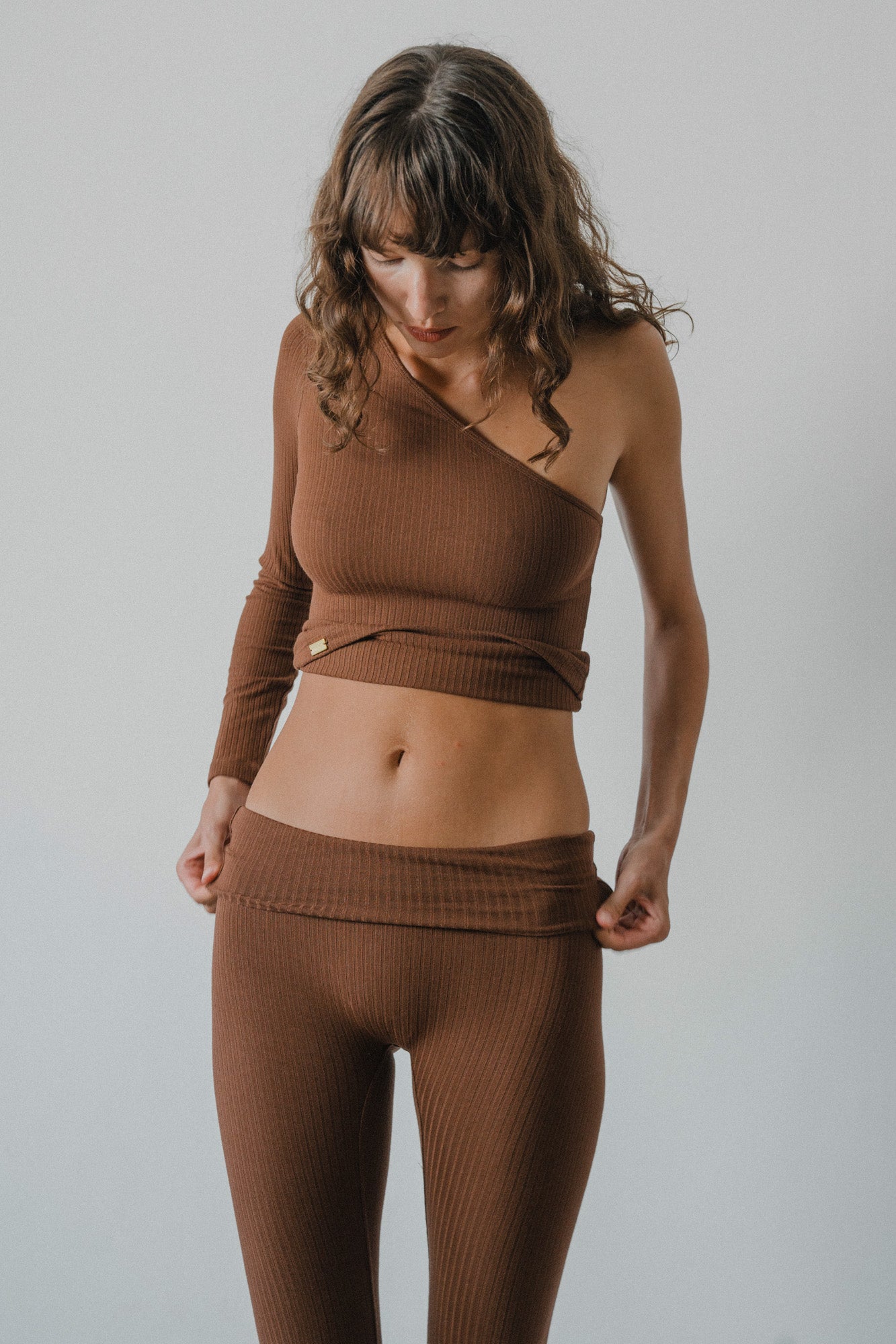 Studio K Rib One Shoulder Top – sustainable, stylish, and comfortable yoga and lounge wear, available in multiple sizes.