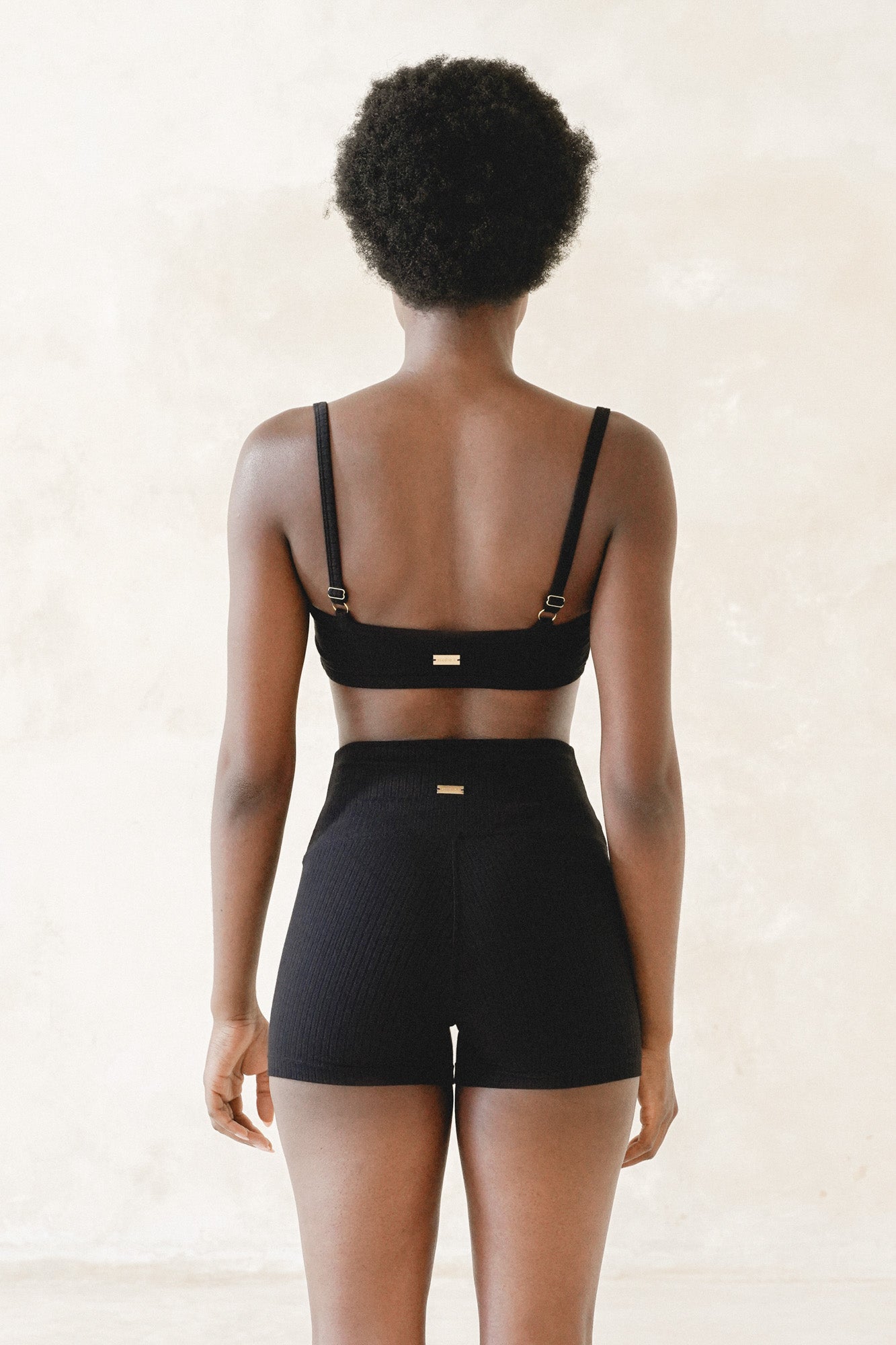 Studio K Rib Bralette and Leggings Set in Black – sustainable, soft, and comfortable yoga and lounge wear, available in multiple sizes.