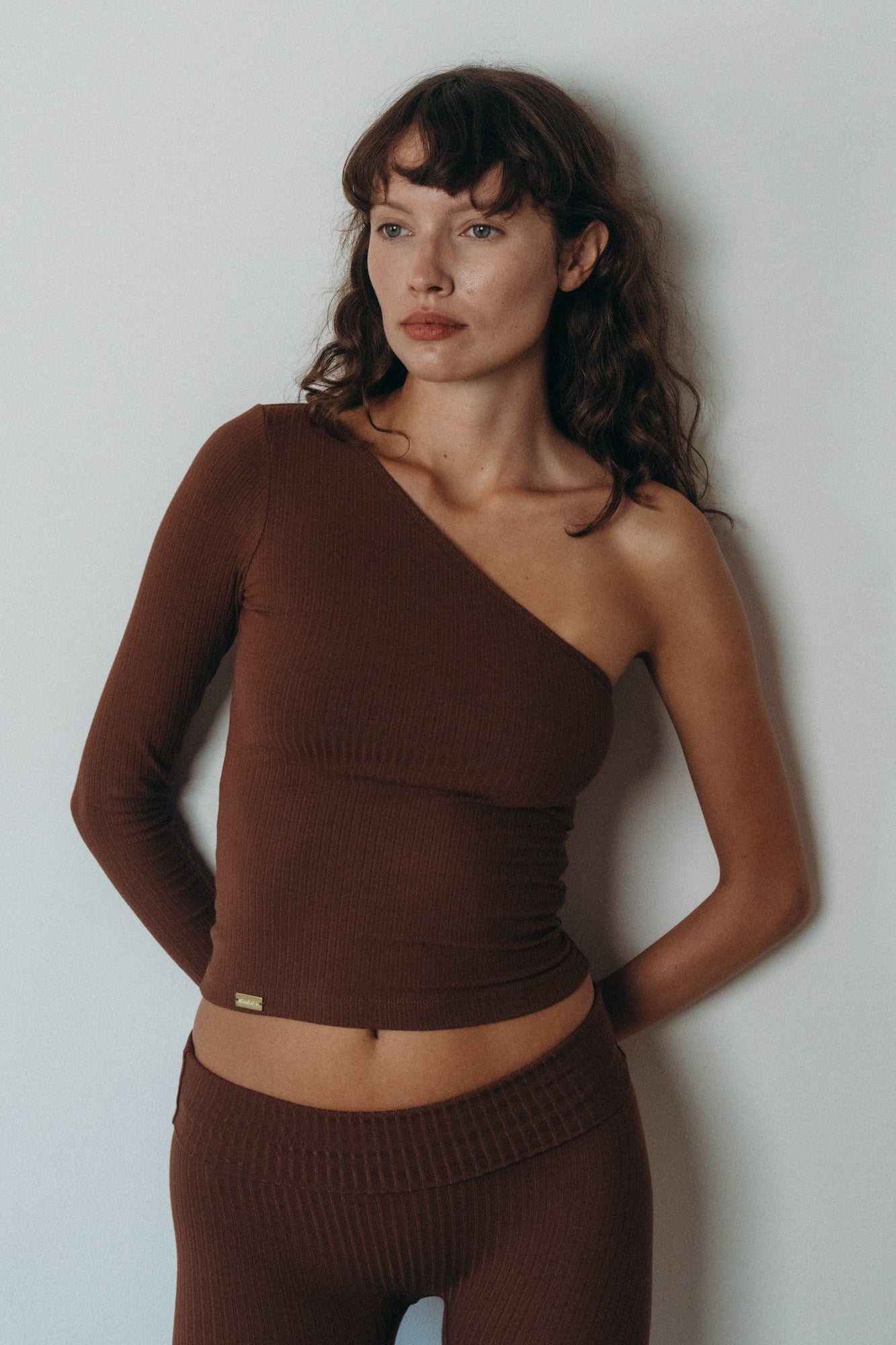 Studio K Rib One Shoulder Top – sustainable, stylish, and comfortable yoga and lounge wear, available in multiple sizes.