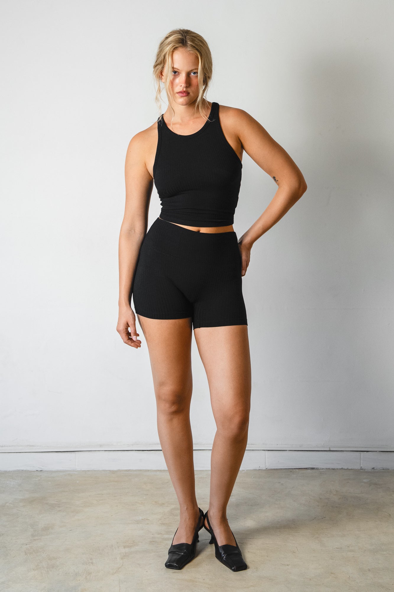 Studio K Rib Tank and Shorts Set in Black – sustainable, soft, and comfortable yoga and lounge wear, available in multiple sizes.